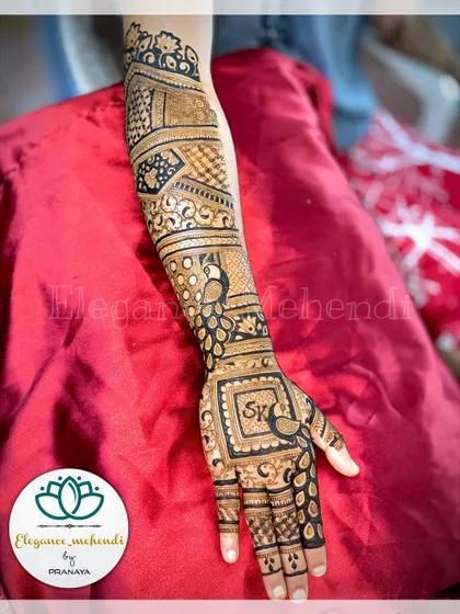 A heavy bridal backhand design with a peacock motif and the initial 'S' for a personal touch.