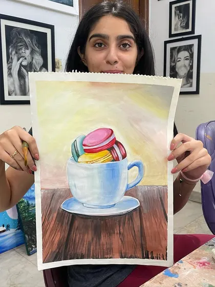 This cheerful painting of macarons in a teacup was created by a student in my poster color class. It's a perfect example of the fun and colorful subjects we work on.