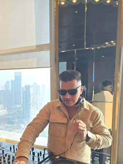A sundowner session with a stunning city view in the background. I enjoy playing a more chilled-out set as the sun goes down before the party kicks off.