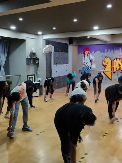Our members doing their cool-down stretches after an intense Zumba session. This helps prevent soreness and improves recovery.