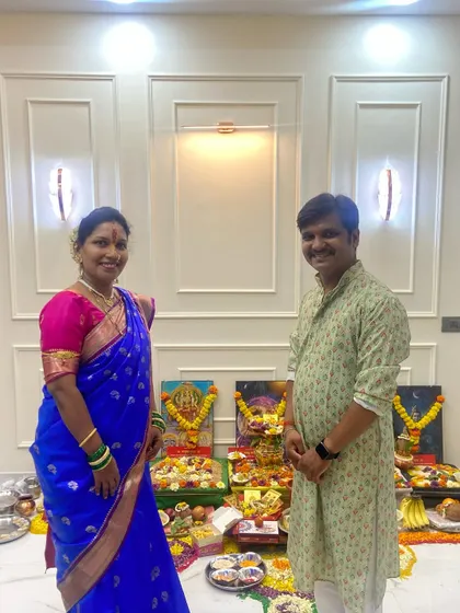 The happy couple, Mr. and Mrs. Pingulkar, during their puja ceremony. Their new 1BHK home is now ready for a lifetime of memories.
