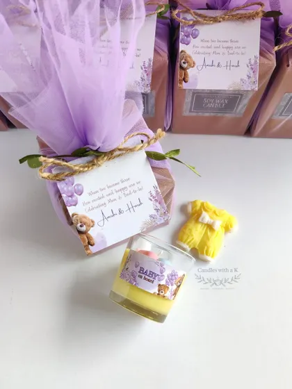 The complete baby shower gift set for Amishi and Harsh, including the votive candle and baby onesie sachet. The personalized card with the teddy bear theme ties everything together beautifully.