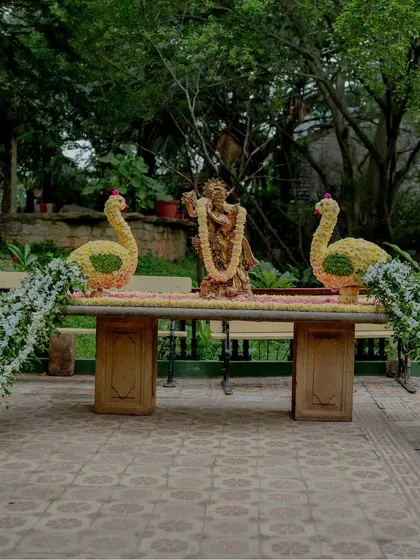 Peacock sculptures made from flowers, a stunning and artistic decor element.