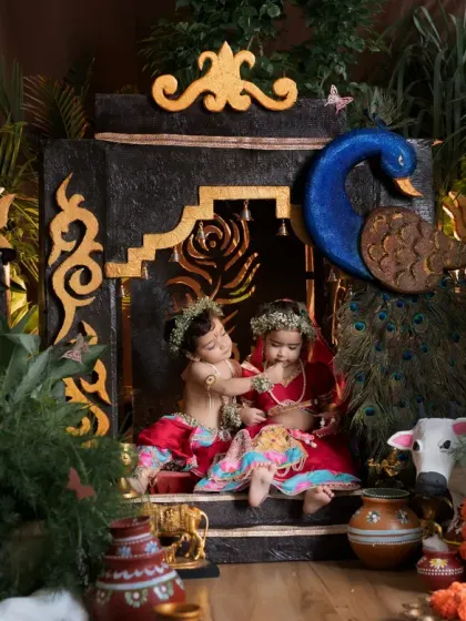 A candid moment between our little Radha and Krishna. These unscripted interactions are often the most heartwarming photos from the session.