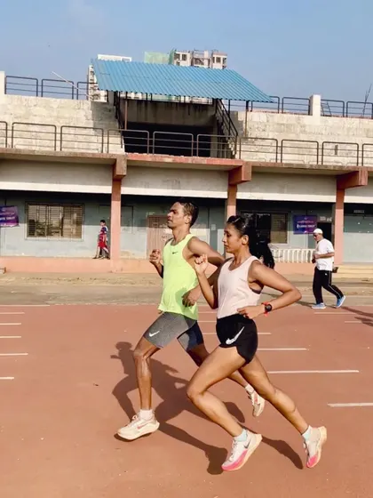 Ask nothing from your running, and you'll get more than you ever imagined. A candid shot of me and my training partner, perfectly in sync on the track.