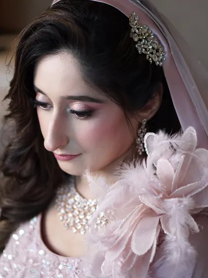 Aaliyah was the picture of timeless elegance on her engagement day. The soft blush hues, shimmering eyes, and flawless finish perfectly complemented her ethereal pink gown and radiant personality.