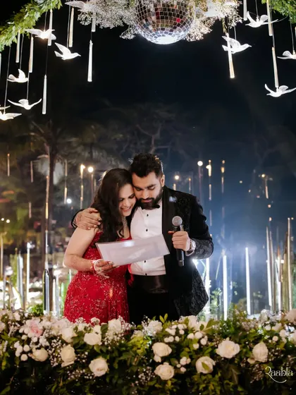 An emotional embrace while reading their vows, this shot captures the deep love and commitment between the couple.