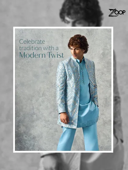Celebrate tradition with a modern twist. This light blue kurta set with a geometric print jacket redefines men's fashion, crafted for elegance and ease for weddings or refined days out.