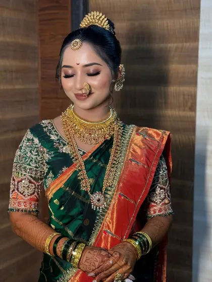 A serene, eyes-closed pose highlighting the flawless and soft eyeshadow work.