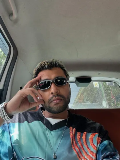 A candid shot in the back of a car, on the way to the next destination.