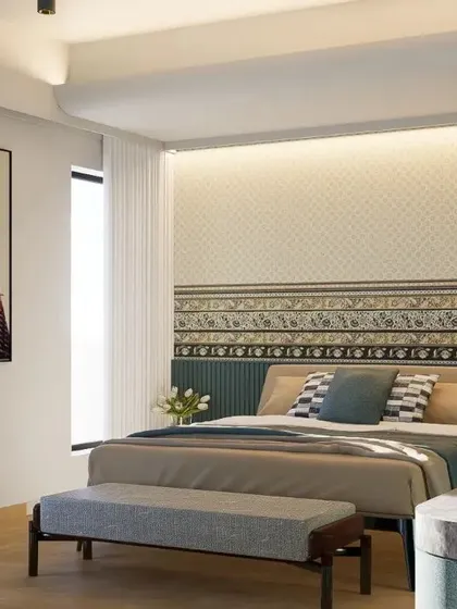 This is where classic meets contemporary. We explored textures and patterns, using a traditional motif on the wallpaper and a vibrant blue fluted panel for the bed back. The overall vibe remains subtle and calm, creating a sophisticated and restful bedroom.