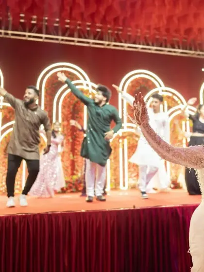 A surprise dance performance by the bride and her friends for the groom at the Sangeet.