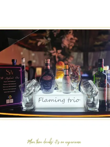 Our Old Fashioned Bar, showcasing a selection of premium whiskies like Royal Salute 21 and Glenfiddich. The menu offers creative twists on the classic, including Espresso and Moroccan variations.