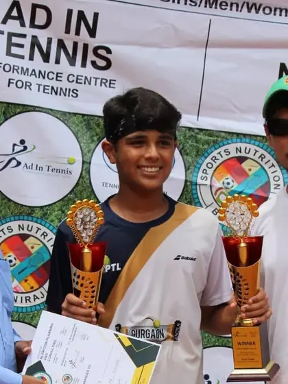 Two champions with their trophies. A great end to a competitive tournament.
