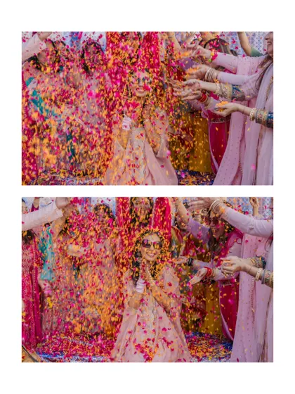A spectacular 'phoolon ki haldi' moment, where the bride is showered in a rainbow of flower petals. These shots are full of color, movement, and pure elation.