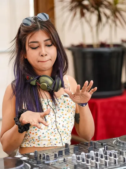 Getting expressive with the music. Daytime parties are all about good vibes and enjoying the moment.