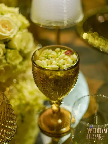 The beautiful fragrance of jasmine buds (mogra) fills the air from this elegant amber-colored glass. We love incorporating sensory details that evoke tradition and nostalgia.