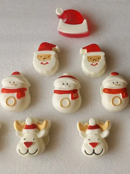 My hand-painted Christmas element soaps, featuring Santa, snowmen, and reindeer. These are made to order and make a perfect Secret Santa gift.