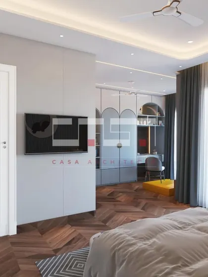 A 3D render of a bedroom for the DLF Belaire project, with beautiful herringbone wood flooring and a separate study area visible through an opening.