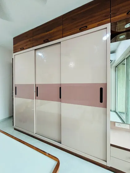 The sliding doors on this wardrobe are perfect for rooms where there isn't enough space for hinged doors to swing open.