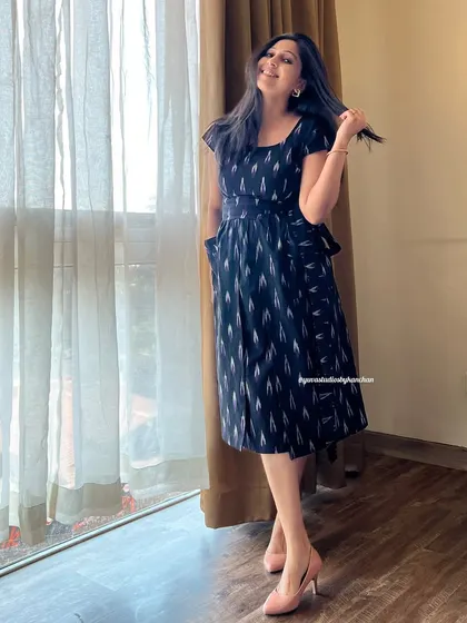 Meet the pinafore dress, my modern take on a classic. Crafted from pure handloom Ikat, it's a versatile piece that you can style for a day at the office or a casual coffee date.
