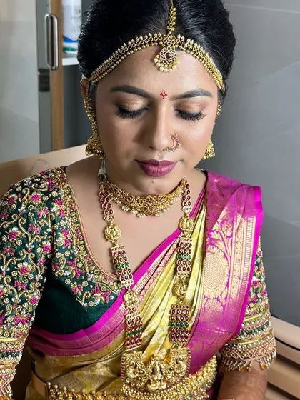 A still portrait capturing the bride's serene and happy expression.