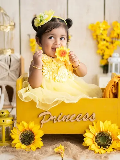 We love bringing vibrant ideas to life. This sunflower-themed first birthday shoot shows how we use color, props, and lighting to create a bright, happy, and unforgettable portrait.