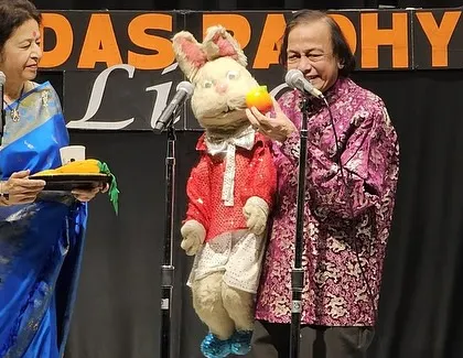 My parents, Ramdas and Aparna Padhye, performing with Bunny the Funny during our USA tour. Their chemistry on stage is timeless.