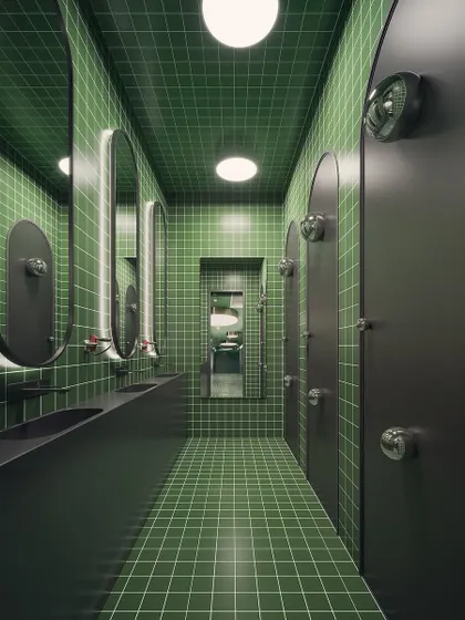 A public washroom concept rendered with a monolithic feel. The floor-to-ceiling green grid tiles and minimalist black fixtures create a bold, modern, and uniform aesthetic.