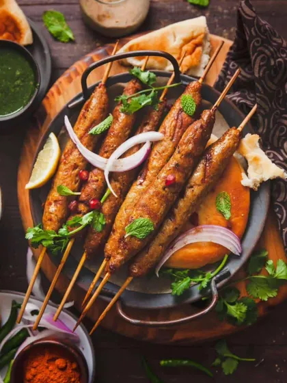 A vegetarian classic, perfected. Our Veg Seekh Kebabs are made with a blend of fresh, seasonal vegetables and aromatic spices, then grilled until tender and smoky. Served with a side of mint chutney.