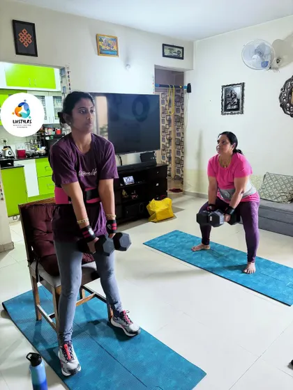 Here, two clients are engaged in a dumbbell workout, focusing on building strength and endurance. I design partner and group sessions to be motivating and effective, catering to different fitness levels simultaneously.