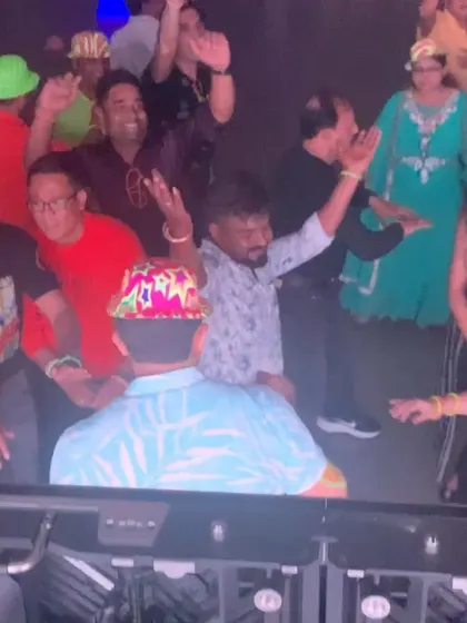 The crowd was all smiles and had their hands in the air.