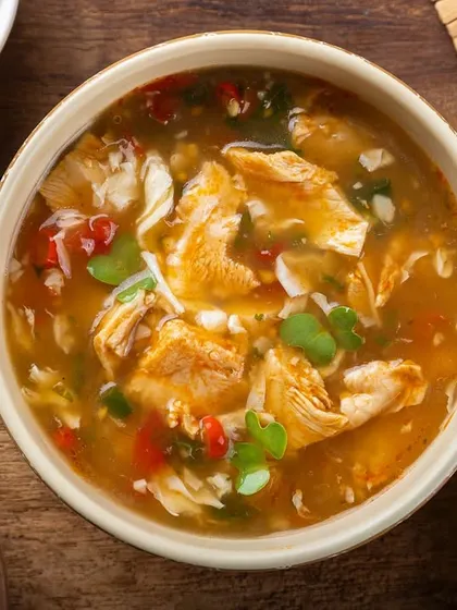 A hot and sour chicken soup, styled with fresh and dried chilies, from my YouMee archive.