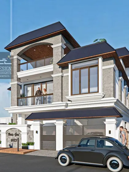 A series of images showcasing the "Veda Giri" residence, a beautiful traditional home design. The house features prominent columns, bay windows, and a distinctive sloped roof design, blending classical Indian elements with a modern sensibility.