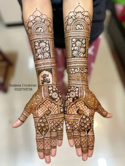 A clear shot of the intricate bridal mehndi, showing the fine lines and detailed patterns.