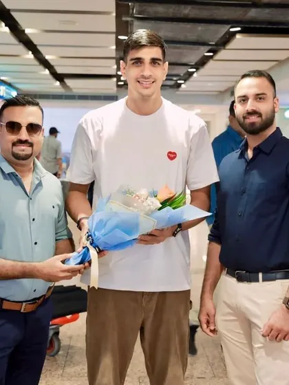 Goalkeeper Gurpreet Singh Sandhu is greeted at the airport in Dubai.