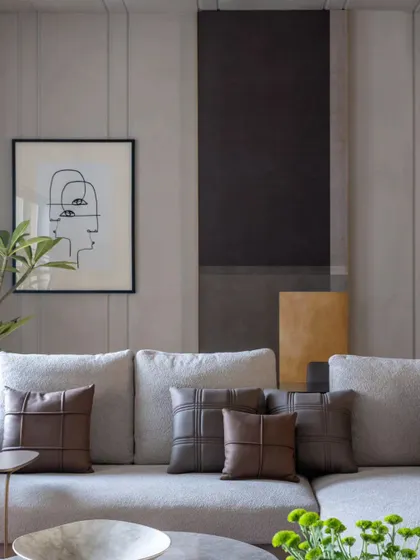 The art panel door is closed, completely hiding the pantry and creating a seamless, artistic wall composition.