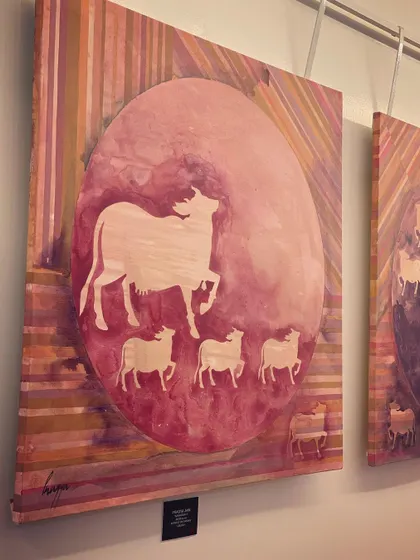 This painting is from my "Kamaduha" series, which blends traditional Pichwai motifs with my modern contemporary style. The sacred cow is depicted in silhouette against a vibrant, textured background, representing my own core of being modern with deep traditional roots.