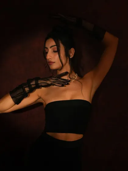 A duplicate of image 27, showcasing the dramatic and elegant pose.