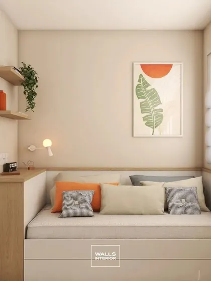 A space-saving design for a compact room, featuring a daybed with built-in storage drawers underneath. The simple floating shelves provide space for decor without taking up floor space.