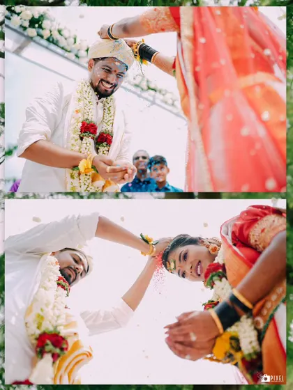 The Talambralu or rice showering ceremony, captured from a creative low angle to emphasize the joy of the moment.
