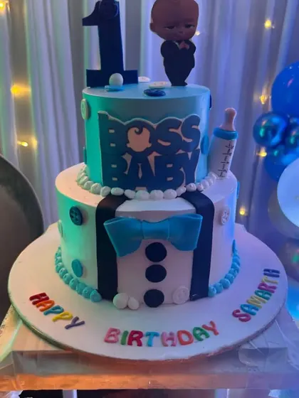 The theme extends to every detail, including the cake. This two-tier Boss Baby cake perfectly matches the decor we set up for Samarth's first birthday party.