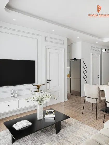 A clean, contemporary living and dining area. I used classic wall molding and a simple color palette to create a feeling of spaciousness and elegance, proving that minimalism can be warm and inviting.