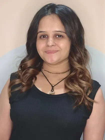 This client looks absolutely radiant with her fresh curls and happy smile.