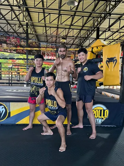 It's all about learning from the best. Posing with my Muay Thai coaches at Apollo Gym in Thailand. Immersing myself in different disciplines keeps my own training and coaching fresh.