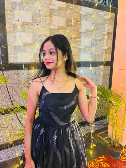 An elegant single-strap black gown with a subtle silver pattern. It's perfect for evening parties and formal functions.