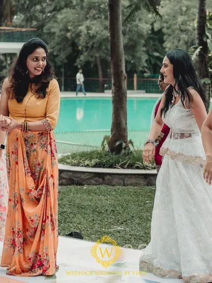 We designed this Haldi and Mehendi with multiple unique color palettes. The decor featured everything from stunning yellow and blue floral arrangements to lively orange accents for a truly dynamic celebration.