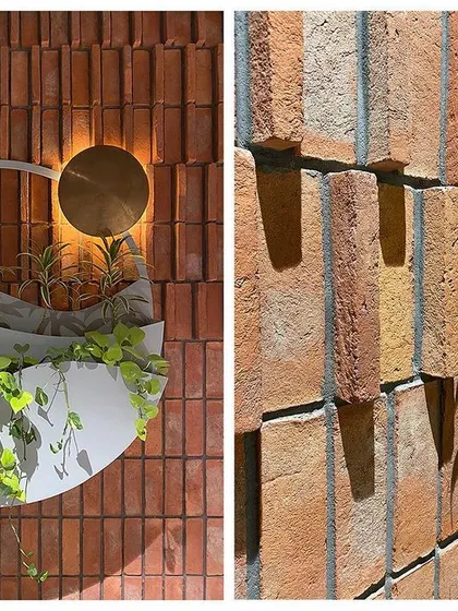A detailed look at the biophilic wall art. The left panel shows the effect of artificial light at night, while the right panel highlights the texture of the brick and the healthy plants, showing how the piece is designed to be beautiful day and night.