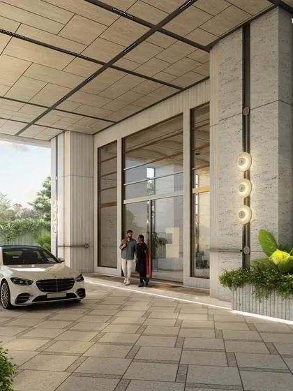 An alternate view of the South Mumbai entrance, featuring a striking sculptural element. The stone-clad podiums and textured towers radiate elegance, sculpting an urban paradise that marries design detail and functionality.