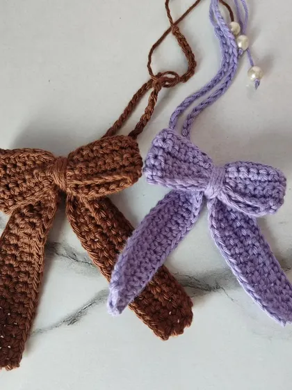 A still shot of my lovely crochet bows. The texture and stitch work are what make these simple accessories so special.